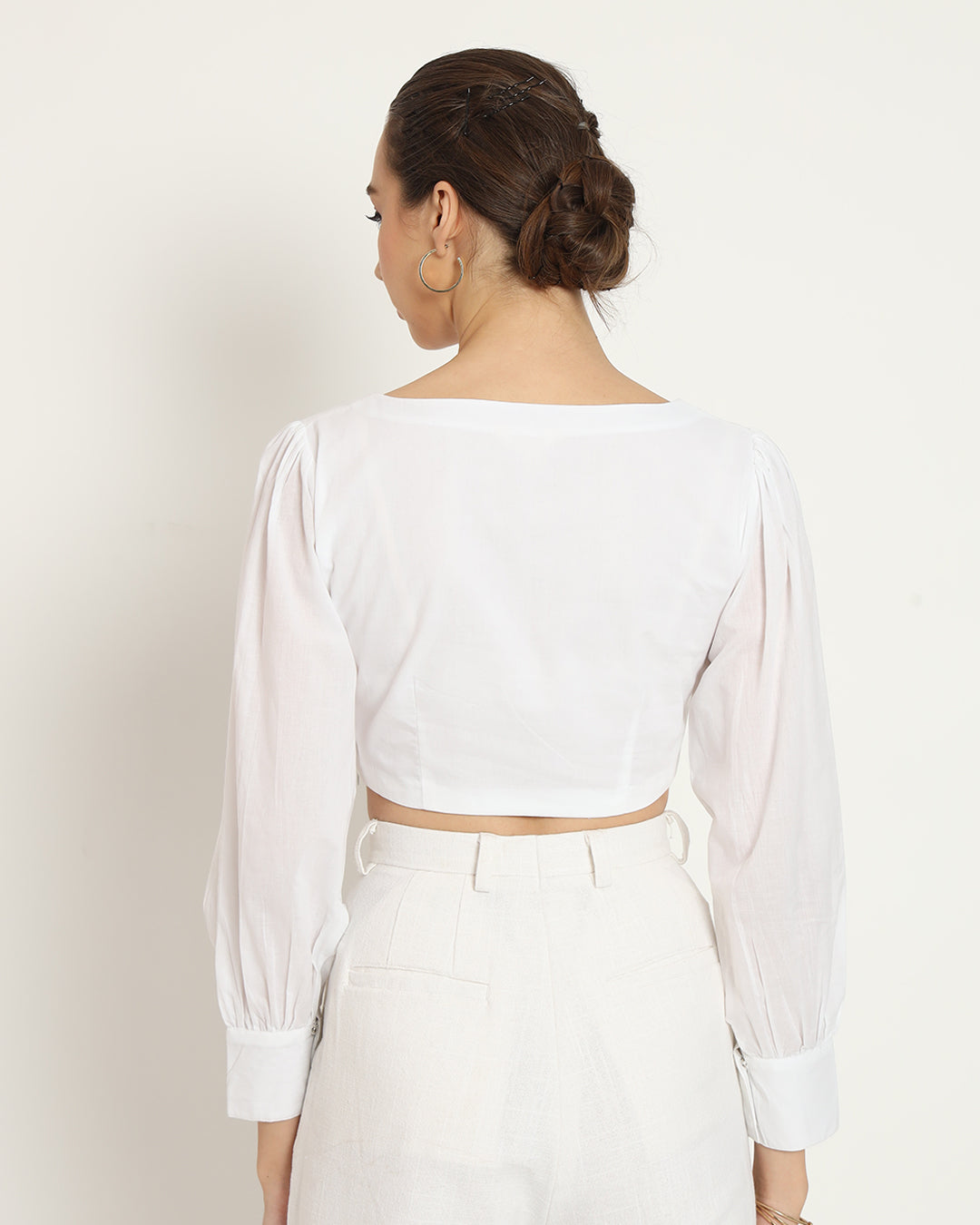 Pristine White Sleek & Sleeveless Blouse