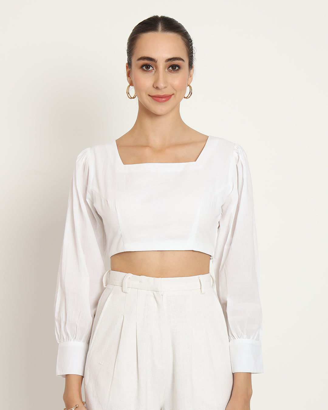 Pristine White Sleek & Sleeveless Blouse